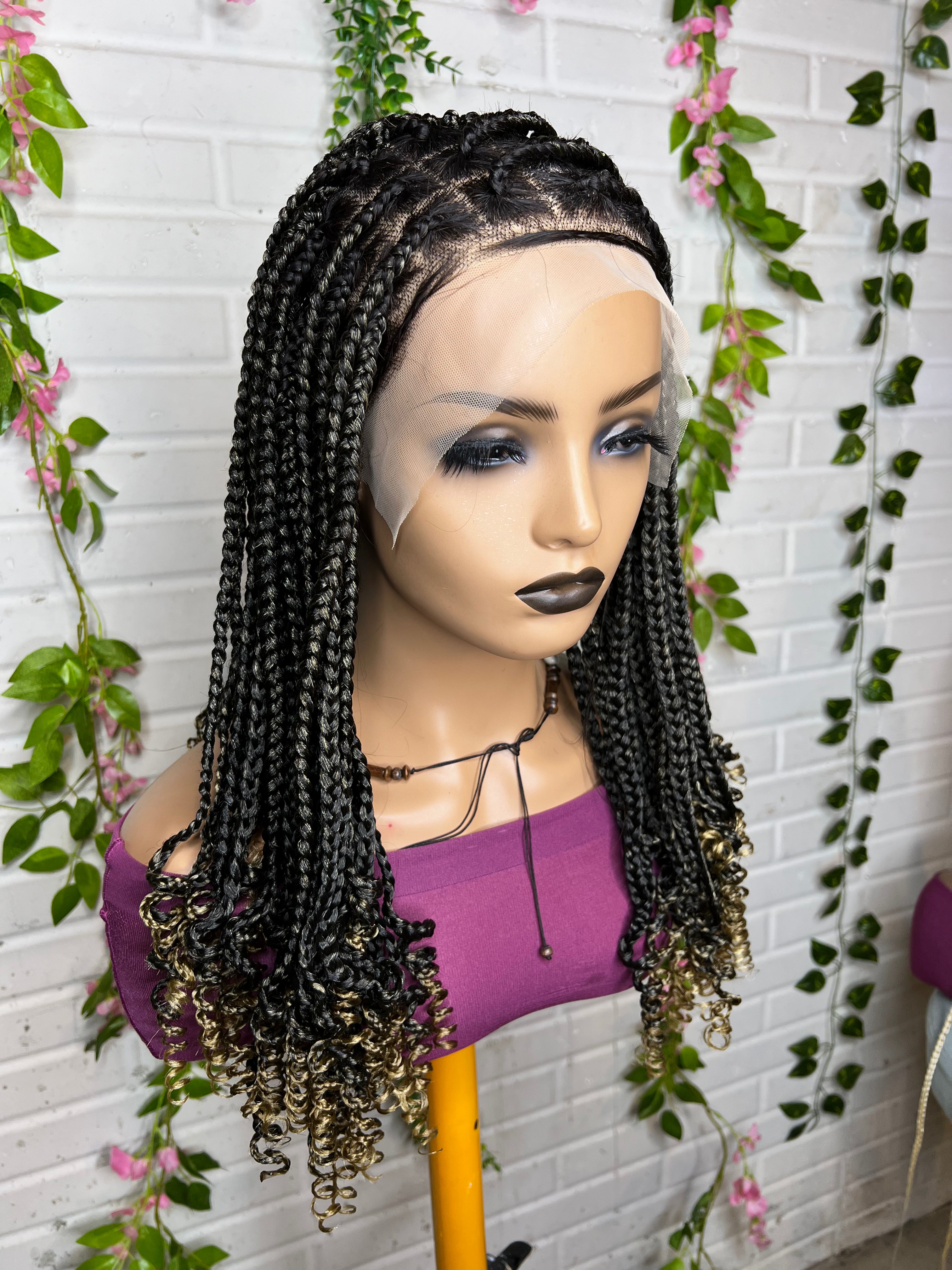 Knotless braids wig lace frontal braiding with hands.