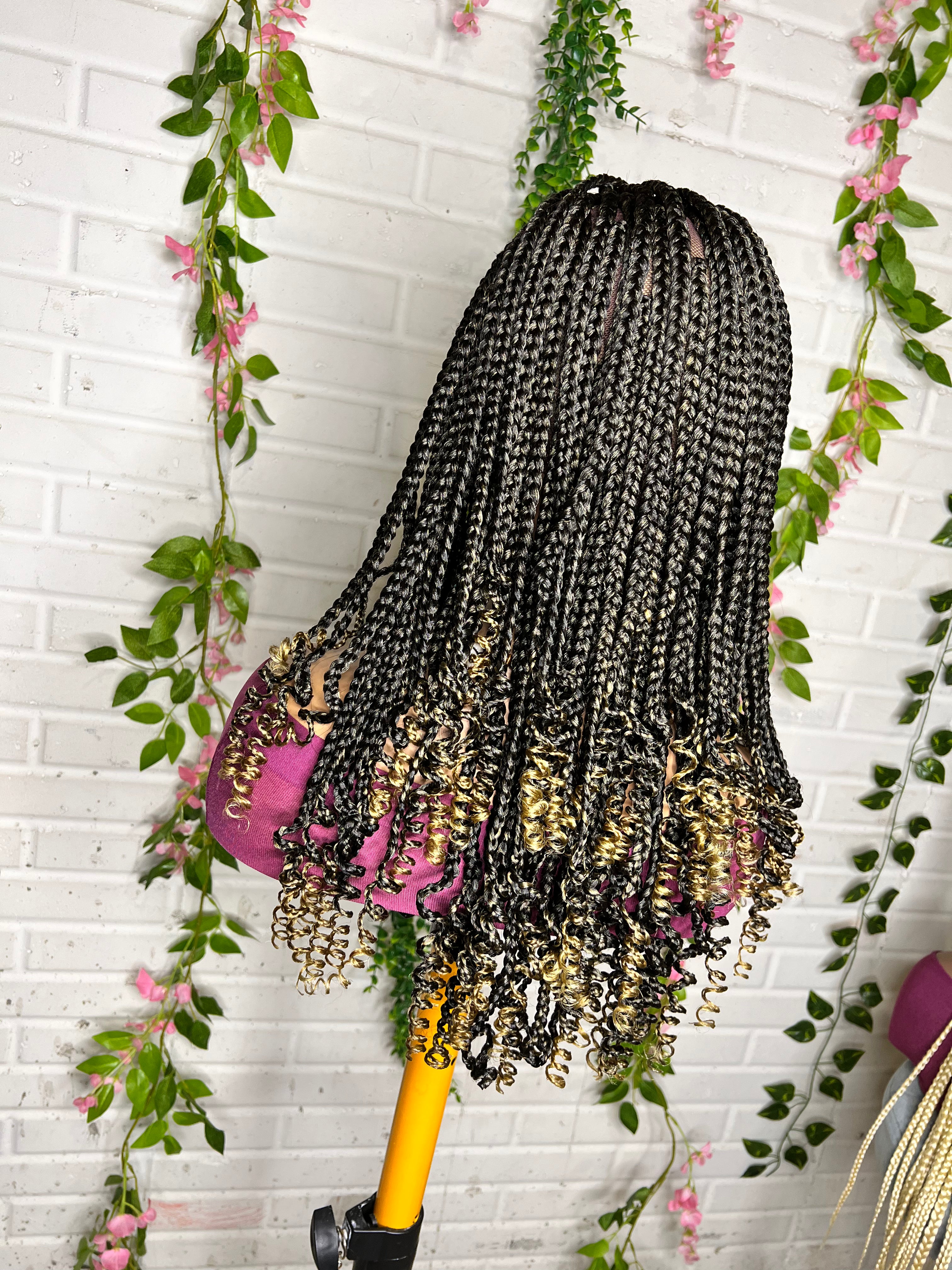 Knotless braids wig lace frontal braiding with hands.